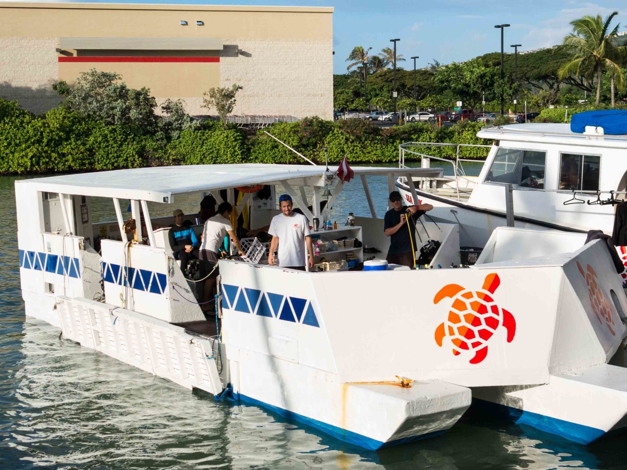 a man riding on the back of a boat